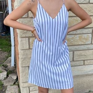 Strappy striped mini dress with slip